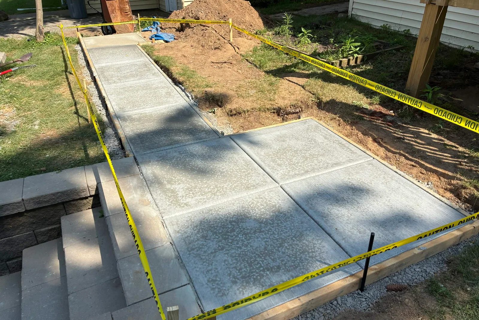 Concrete walkway and landing while curing