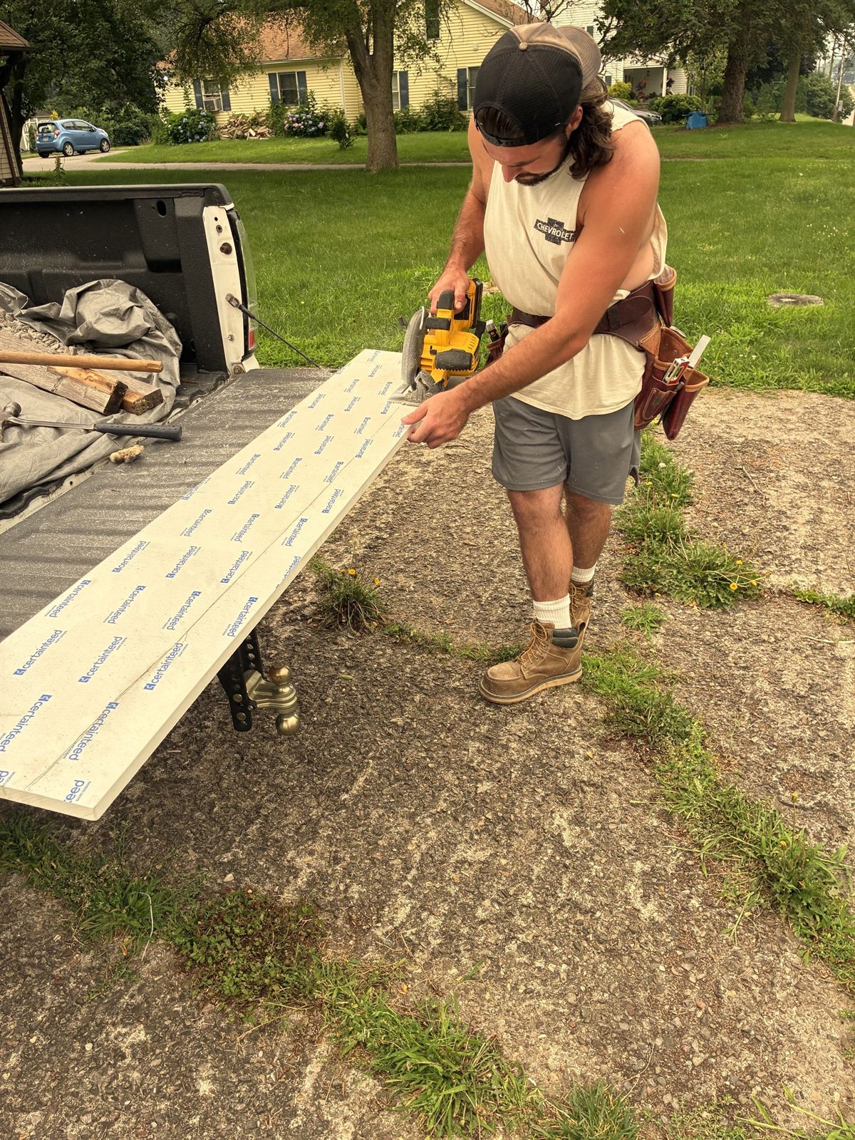 OCD Properties team member preparing material for a property repair